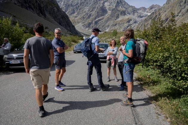 Vehicles Evacuated by Helicopter After Floods - France Vehicle owners and operation staff wait beside parked cars at the Ailefroide landing area. Nine vehicles stranded at the Pre de Madame Carle were evacuated by helicopter after floods on August 28 destroyed several sections of the RD204T access road. Ailefroide, Vallouise-Pelvoux, Hautes-Alpes, France, September 24, 2026. Photo by Thibaut Durand ABACAPRESS.COM vallouise-pelvoux PROVENCE-ALPES-COTE D AZUR France  Copyright: xDurandxThibaut ABACAx