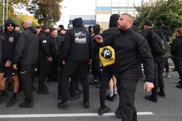 September 24, 2026, Basingstoke, Hampshire, UK: Basingstoke, UK. Members of The Patriot Platform and supporters Protest outside a police station where Daniel Thomas, also know as Danny Tommo, is being held, in Basingstoke, Hampshire. Anti-migrant protester Daniel Thomas has been arrested on suspicion of criminal damage with intent to endanger life after an incident in the English Channel. Basingstoke UK  - ZUMAl94_ 20260924_zaf_l94_034 Copyright: xJacquelinexLawriex