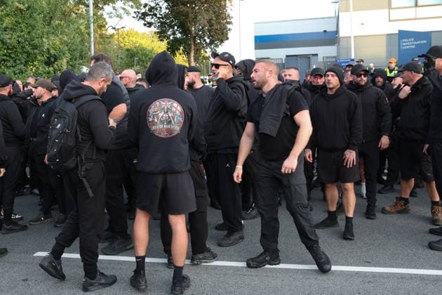 September 24, 2026, Basingstoke, Hampshire, UK: Basingstoke, UK. Members of The Patriot Platform and supporters Protest outside a police station where Daniel Thomas, also know as Danny Tommo, is being held, in Basingstoke, Hampshire. Anti-migrant protester Daniel Thomas has been arrested on suspicion of criminal damage with intent to endanger life after an incident in the English Channel. Basingstoke UK  - ZUMAl94_ 20260924_zaf_l94_026 Copyright: xJacquelinexLawriex