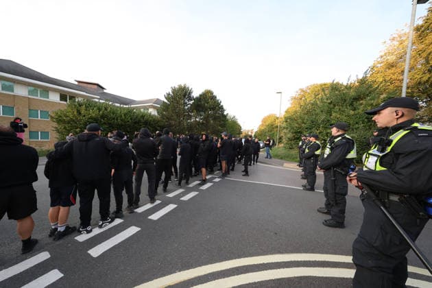 September 24, 2026, Basingstoke, Hampshire, UK: Basingstoke, UK. Members of The Patriot Platform and supporters Protest outside a police station where Daniel Thomas, also know as Danny Tommo, is being held, in Basingstoke, Hampshire. Anti-migrant protester Daniel Thomas has been arrested on suspicion of criminal damage with intent to endanger life after an incident in the English Channel. Basingstoke UK  - ZUMAl94_ 20260924_zaf_l94_028 Copyright: xJacquelinexLawriex