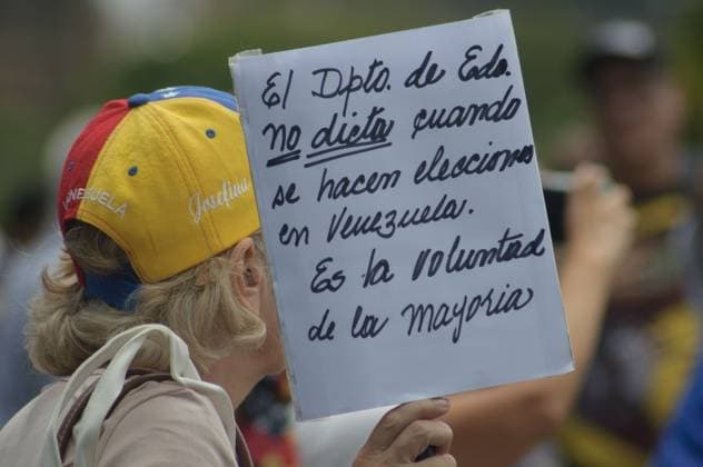 September 24, 2026, Caracas, Venezuela (Bolivarian Republic of: CARACAS, VENEZUELA, SEPTEMBER 24, 2026: Opposition supporters demonstrate in Caracas demanding that opposition leader MaroÂ­a Corina Machado be allowed to return to Venezuela and calling for new presidential elections. Protesters gathered at Plaza Venezuela before marching toward the headquarters of the National Electoral Council (CNE). Some demonstrators later occupied a section of the Gran Cacique Guaicaipuro highway near the Central University of Venezuela, disrupting traffic. Caracas Venezuela (Bolivarian Republic of  - ZUMAq101 20260924_zna_q101_205 Copyright: xMarioxFloresx