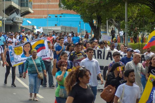 September 24, 2026, Caracas, Venezuela (Bolivarian Republic of: CARACAS, VENEZUELA, SEPTEMBER 24, 2026: Opposition supporters demonstrate in Caracas demanding that opposition leader MaroÂ­a Corina Machado be allowed to return to Venezuela and calling for new presidential elections. Protesters gathered at Plaza Venezuela before marching toward the headquarters of the National Electoral Council (CNE). Some demonstrators later occupied a section of the Gran Cacique Guaicaipuro highway near the Central University of Venezuela, disrupting traffic. Caracas Venezuela (Bolivarian Republic of  - ZUMAq101 20260924_zna_q101_181 Copyright: xMarioxFloresx