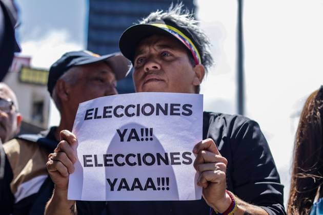 September 24, 2026, Caracas, Venezuela (Bolivarian Republic of: CARACAS, VENEZUELA, SEPTEMBER 24, 2026: Opposition supporters demonstrate in Caracas demanding that opposition leader MaroÂ­a Corina Machado be allowed to return to Venezuela and calling for new presidential elections. Protesters gathered at Plaza Venezuela before marching toward the headquarters of the National Electoral Council (CNE). Some demonstrators later occupied a section of the Gran Cacique Guaicaipuro highway near the Central University of Venezuela, disrupting traffic. Caracas Venezuela (Bolivarian Republic of  - ZUMAq101 20260924_zna_q101_192 Copyright: xMarioxFloresx