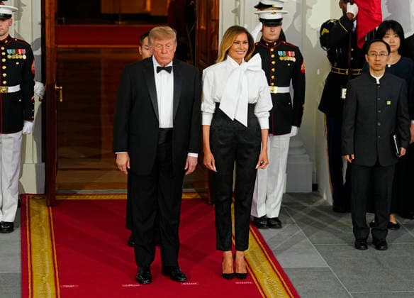 President Donald Trump and First Lady Melania Trump wait for the arrival of Chinese President Xi Jinping and his wife Peng Liyuan before a state dinner at the White House in Washington DC on Thursday, September 24, 2026. Xi is on a three-day state visit to the U.S. and will hold talks with U.S. officials on tariffs, AI, and other issues.  WAP20260924703 BONNIExCASH