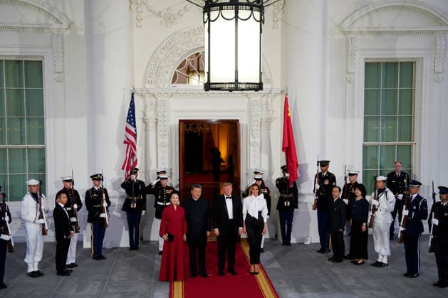 President Donald Trump and First Lady Melania Trump greet Chinese President Xi Jinping and his wife Peng Liyuan as they arrive for a state dinner at the White House in Washington DC on Thursday, September 24, 2026. Xi is on a three-day state visit to the U.S. and will hold talks with U.S. officials on tariffs, AI, and other issues.  WAP20260924617 BONNIExCASH
