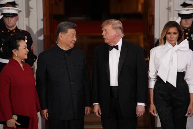 Chinese President Xi Jinping and his wife Peng Liyuan stand with President Donald Trump and First Lady Melania Trump as they arrive for a state dinner at the White House in Washington DC on Thursday, September 24, 2026.  WAX202609249758 YURIxGRIPAS