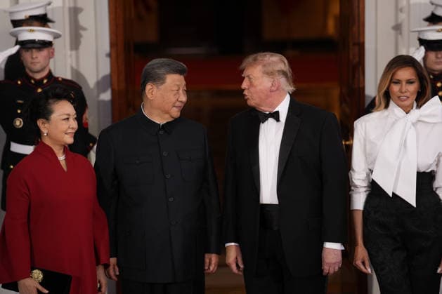 Chinese President Xi Jinping and his wife Peng Liyuan stand with President Donald Trump and First Lady Melania Trump as they arrive for a state dinner at the White House in Washington DC on Thursday, September 24, 2026.  WAX202609249759 YURIxGRIPAS