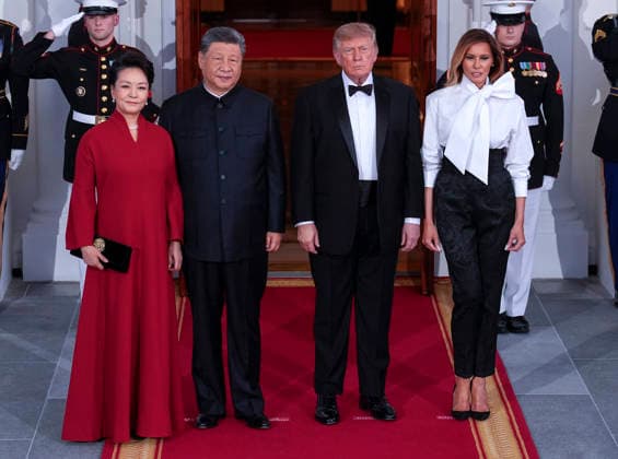 Chinese President Xi Jinping and his wife Peng Liyuan stand with President Donald Trump and First Lady Melania Trump as they arrive for a state dinner at the White House in Washington DC on Thursday, September 24, 2026.  WAX202609249763 YURIxGRIPAS