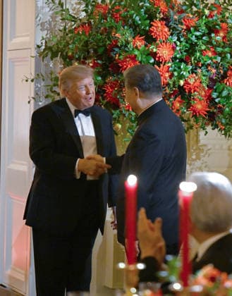 President Donald J Trump and Chinese President Xi Jinping shake hands as they exchange toasts during a state dinner at the White House in Washington DC on Thursday, September 24, 2026. Xi is on a three-day state visit to the U.S. and will hold talks with U.S. officials on tariffs, AI, and other issues.  WAX20260924981 AnnabellexGordon