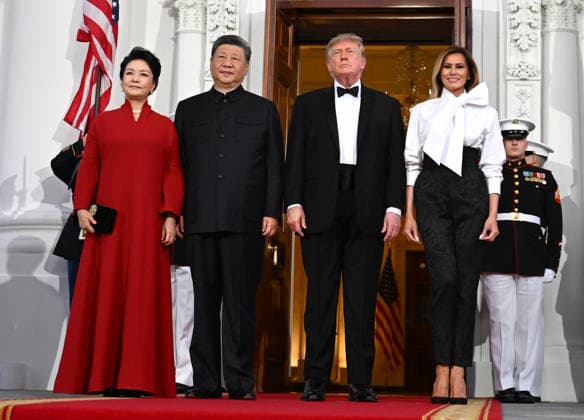Chinese President Xi Jinping and his wife Peng Liyuan stand with President Donald Trump and First Lady Melania Trump as they arrive for a state dinner at the White House in Washington DC on Thursday, September 24, 2026.  WAX20260924993 AnnabellexGordon