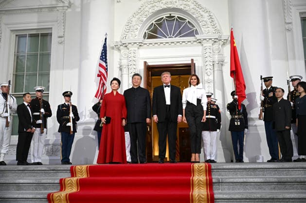 Chinese President Xi Jinping and his wife Peng Liyuan stand with President Donald Trump and First Lady Melania Trump as they arrive for a state dinner at the White House in Washington DC on Thursday, September 24, 2026.  WAX20260924994 AnnabellexGordon
