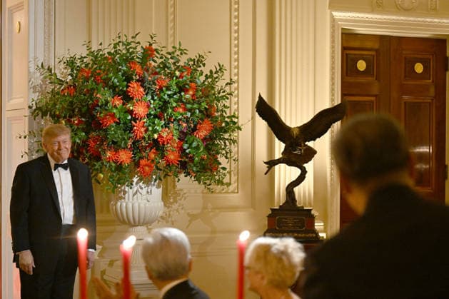 President Donald Trump makes remarks as he presents a statue of a bald eagle to Chinese President Xi Jinping during an official state dinner at the White House in Washington DC on Thursday, September 24, 2026. Xi is on a three-day state visit to the U.S. and will hold talks with U.S. officials on tariffs, AI, and other issues.  WAX20260924504 AnnabellexGordon