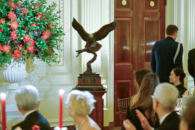 A statue of a bald eagle is presented to Chinese President Xi Jinping by President Donald Trump during an official state dinner at the White House in Washington DC on Thursday, September 24, 2026. Xi is on a three-day state visit to the U.S. and will hold talks with U.S. officials on tariffs, AI, and other issues.  WAX20260924505 AnnabellexGordon