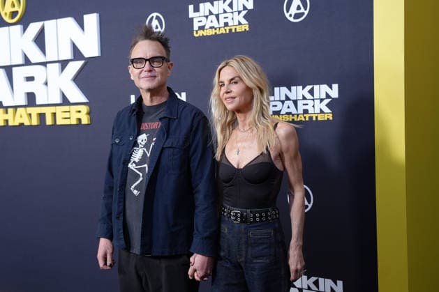 Mark Hoppus (left), bassist and vocalist for the American band Blink-182, poses with his wife Skye Everly during the world premiere of the documentary Linkin Park: Unshatter at the AMC The Grove 14 in Los Angeles, United States, 24 September 2026. Linkin Park releases its documentary in Los Angeles !ACHTUNG: NUR REDAKTIONELLE NUTZUNG!  Copyright: xOmarxAlonsox AME364 20260925-55021498019_1