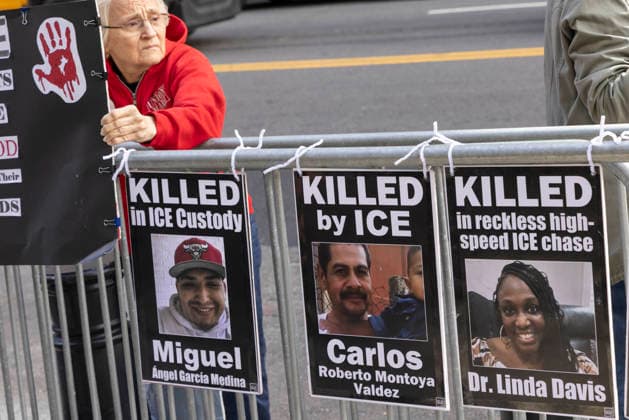 September 24, 2026, New York, New York, USA: A protester holds a sign with a bloody handprint standing next to placards attached to a police barricade at Rise and Resist s weekly vigil for those impacted by President Trump s immigrant detention and mass deportation policies, held outside the immigration courts, Department of Homeland Security and ICE offices at 26 Federal Plaza in Lower Manhattan. Signs read KILLED in ICE Custody Miguel Angel Garcia Medina KILLED by ICE Carlos Roberto Montoya Valdez KILLED in reckless high-speed ICE chase Dr. Linda Davis with their images. New York USA  - ZUMAr174 20260924_znp_r174_024 Copyright: xGinaxMxRandazzox