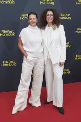 Catrin Striebeck and Malika Rabahallah at the festival opening, featuring the premiere of the feature film *The Idiots* at the 34th Filmfest Hamburg 2026 at Cinemaxx Dammtor in Hamburg, September 24, 2026 Foto:xgbrcix xFuturexImagex filmfest_hh_6721