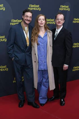 Fridolin Sandmeyer, Pheline Roggan, and Merlin Sandmeyer at the festival opening, featuring the premiere of the feature film *The Idiot s* at the 34th Filmfest Hamburg 2026 at Cinemaxx Dammtor in Hamburg, September 24, 2026 Foto:xgbrcix xFuturexImagex filmfest_hh_6760