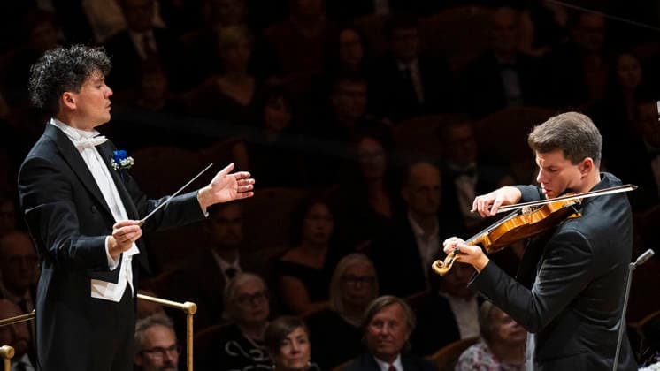 Opening concert of the 100th season of the Prague Radio Symphony Orchestra (SOCR) under the baton of its new chief conductor, Eliase Grandy, left, took place in Prague, Czech Republic, on September 24, 2026. On the right side is seen soloist Jan Mracek. (CTKxPhoto MichalxKamaryt) CTKPhotoP2026092410480  CTKPhotoP2026092410480