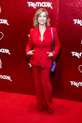 ABB TKMAXX Tina Ruland in a red pantsuit on the red carpet at the grand reopening of the TK Maxx store on Alexanderplatz on September 24, 2026, in Berlin, Germany