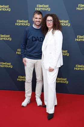 Christoph Pellander and Malika Rabahallah at the festival opening, featuring the premiere of the feature film *The Idiots* at the 34th Filmfest Hamburg 2026 at Cinemaxx Dammtor in Hamburg, September 24, 2026 Foto:xC.xTamckex xFuturexImagex filmfest_hh_6838
