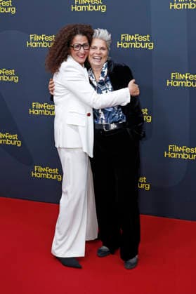 Malika Rabahallah and Sarah Wiener at the festival opening, featuring the premiere of the film *The Idiots* at the 34th Filmfest Hamburg 2026 at Cinemaxx Dammtor in Hamburg, September 24, 2026 Foto:xC.xTamckex xFuturexImagex filmfest_hh_6863