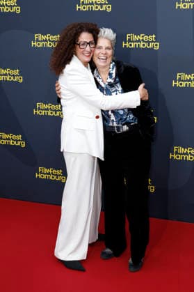 Malika Rabahallah and Sarah Wiener at the festival opening, featuring the premiere of the film *The Idiots* at the 34th Filmfest Hamburg 2026 at Cinemaxx Dammtor in Hamburg, September 24, 2026 Foto:xC.xTamckex xFuturexImagex filmfest_hh_6864