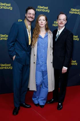 Fridolin Sandmeyer, Pheline Roggan, and Merlin Sandmeyer at the festival opening, featuring the premiere of the feature film *The Idiot* at the 34th Filmfest Hamburg 2026 at Cinemaxx Dammtor in Hamburg, September 24, 2026 Foto:xC.xTamckex xFuturexImagex filmfest_hh_6917