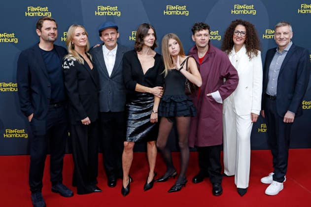 Michal Englert, Malgorzata Szumowska, Christian Friedel, Malika Rabahallah, and the film crew at the festival opening, featuring the premiere of the feature film *The Idiot* at the 34th Filmfest Hamburg 2026 at Cinemaxx Dammtor in Hamburg, September 24, 2026 Foto:xC.xTamckex xFuturexImagex filmfest_hh_6940