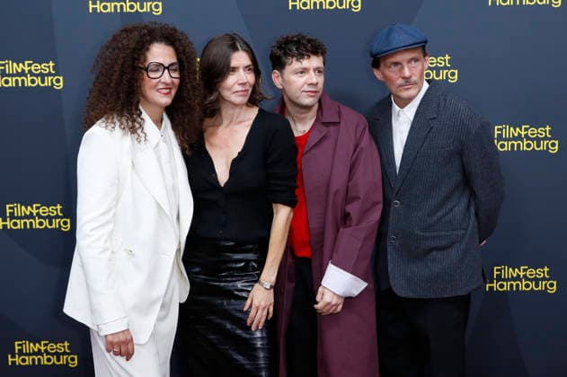 Malika Rabahallah, Malgorzata Szumowska, Christian Friedel, and Michal Englert at the festival opening, featuring the premiere of the film *The Idiots* at the 34th Filmfest Hamburg 2026 at Cinemaxx Dammtor in Hamburg, September 24, 2026 Foto:xC.xTamckex xFuturexImagex filmfest_hh_6953