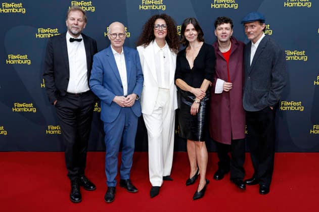 Helge Albers, Peter Tschentscher, Malika Rabahallah, Malgorzata Szumowska, Christian Friedel and Michal Englert at the festival opening with the premiere of the feature film *The Idiots* at the 34th Filmfest Hamburg 2026 at Cinemaxx Dammtor in Hamburg, September 24, 2026 Foto:xC.xTamckex xFuturexImagex filmfest_hh_6954