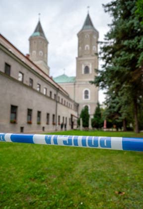 Ukrainian man stabs five people in a Polish monastery Photo: Maciej Napora East News Police line blocks access to the crime scene after a stabbing attack at the Benedictine s abbey on September 24, 2026 in the town of Jaroslaw in south-eastern Poland. A 31-year-old Ukrainian man stabbed five people with a kitchen knife, killing a priest and wounding four other victims. The perpetrator, whose motives are so far unknown, was apprehended by the police. EN_01684814_0003 