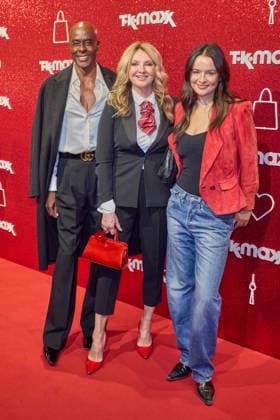 Bruce Darnell, Frauke Ludowig, and Nele Ludowig celebrate the reopening of the expanded TK Maxx store at the CODE RED Night event at Alexanderplatz in Berlin on September 24, 2026. TK Maxx Store Reopening