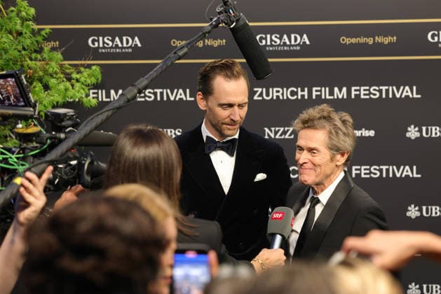 22nd Zurich Film Festival 2026: Tom Hiddleston (Thomas William Hiddleston), British actor, and Willem Dafoe (William James Dafoe), an American actor on the green carpet at the Opening Night of the 22nd Zurich Film Festival on September 24, 2026, at the Kongresshaus Zurich in the Canton of Zurich, Switzerland