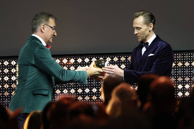 22nd Zurich Film Festival 2026: Christian Jungen presents the Golden Eye Award to Tom Hiddleston (Thomas William Hiddleston), a British actor, on the opening night of the 22nd Zurich Film Festival on September 24, 2026, at the Kongresshaus Zurich in the Canton of Zurich, Switzerland