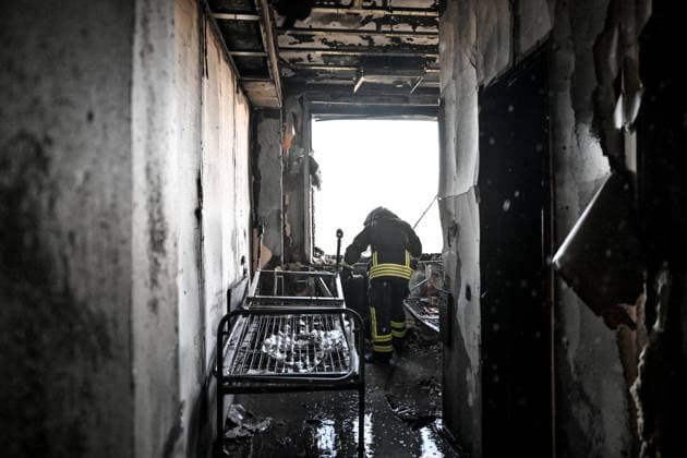 A rescuer works inside a burnt-out room of a medical centre damaged by a Russian drone strike in Zaporizhzhia, Ukraine, September 25, 2026. Early on Friday, September 25, Russian drones attacked the southeastern city, injuring one person and setting fire to the medical centre. (Photo by Dmytro Smolienko Ukrinform) Russian drones attack medical centre in Zaporizhzhia  Copyright: xDmytroxSmolienkox