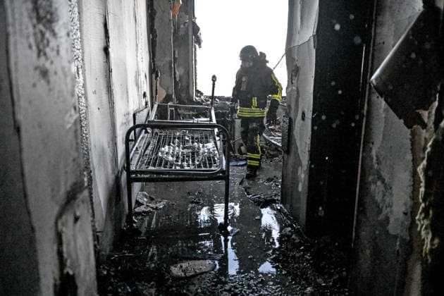 A rescuer works inside a burnt-out room of a medical centre damaged by a Russian drone strike in Zaporizhzhia, Ukraine, September 25, 2026. Early on Friday, September 25, Russian drones attacked the southeastern city, injuring one person and setting fire to the medical centre. (Photo by Dmytro Smolienko Ukrinform) Russian drones attack medical centre in Zaporizhzhia  Copyright: xDmytroxSmolienkox