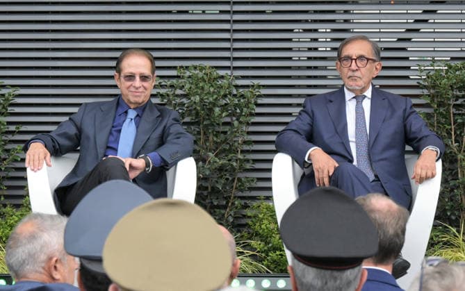 IPA88957048 - Milan, Italy: Silvio Berlusconi had Milan Malpensa International Airport named after him in an official ceremony, with a plaque unveiled on the main facade of Terminal 1 In the photo: Ignazio La Russa, President of the Senate, with Paolo Berlusconi during the ceremony  Copyright: xNickxZonnax xNickxZonnax IPA88957048
