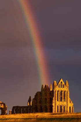 September 25, 2026, Whitby, Yorkshire, UK: A rainbow forms this morning over the Gothic ruins of Whitby Abbey as the sun starts to rise on the Yorkshire coast. Whitby UK  - ZUMAl94_ 20260925_zaf_l94_002 Copyright: xAndrewxMccarenx