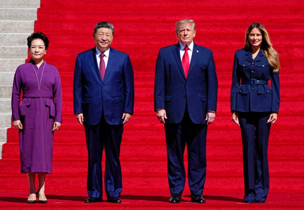 Chinese President Xi Jinping and his wife Peng Liyuan stand with President Donald Trump and First Lady Melania Trump as they arrive at the National Archives in Washington DC on Friday, September 25, 2026. Xi is on the final day of an official three-day state visit to the U.S.  WAP20260925702 BONNIExCASH