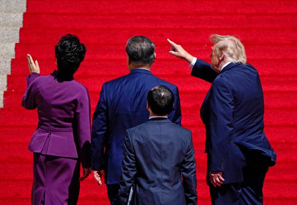 Chinese President Xi Jinping and his wife Peng Liyuan are escorted into the National Archives by President Donald Trump and First Lady Melania Trump in Washington DC on Friday, September 25, 2026. Xi is on the final day of an official three-day state visit to the U.S.  WAP20260925708 BONNIExCASH