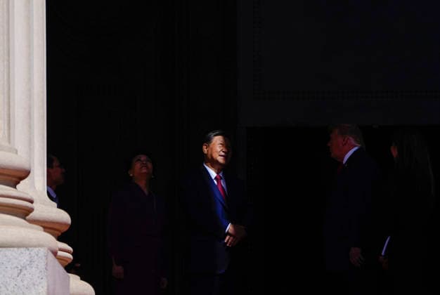 Chinese President Xi Jinping and his wife Peng Liyuan are escorted into the National Archives by President Donald Trump and First Lady Melania Trump in Washington DC on Friday, September 25, 2026. Xi is on the final day of an official three-day state visit to the U.S.  WAP20260925716 BONNIExCASH