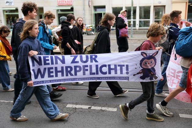 Protesters march down Friedrich-Ebert-Straße carrying a banner reading No to Conscription during a demonstration against conscription, Potsdam, September 25, 2026. School strike against conscription in Potsdam