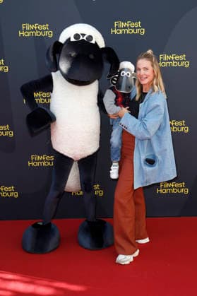 Svenja Holtmann with her son Louie at the premiere of the movie *Shaun the Sheep: The Beast of Mossy Bottom* at the 34th Filmfest Hamburg 2026 at Cinemaxx Dammtor in Hamburg, September 25, 2026 Foto:xC.xTamckex xFuturexImagex shaun_6907