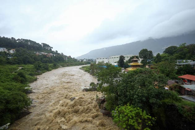 Red Alert Issued In Parts Of Nepal As Landslide Blocks Highways, Water Level Surge High Following Incessant Rainfall Flood water along the Bagmati River is seen from the Chobhar Gorge following heavy rain over two days on September 25, 2026. The Weather Forecasting Division under the Department of Hydrology and Meteorology (DHM) has issued a five-day special weather warning bulletin, urging the public and concerned agencies to remain alert Friday and Saturday as rainfall and weather-related hazards are expected to increase across various parts of the country. In capital Kathmandu, the Bagmati River has swollen and breached its embankments following rainfall of over 36 hours. The DHM has further warned of light to heavy rainfall and weather-  Copyright: xSubaasxShresthax originalFilename: shrestha-redalert260925_npDTC.jpg