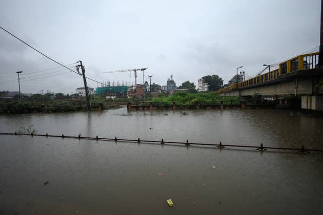Red Alert Issued In Parts Of Nepal As Landslide Blocks Highways, Water Level Surge High Following Incessant Rainfall A section of road along the Bagmati River corridor in Kathmandu, Nepal, is flooded following heavy rain over two days on September 25, 2026. The Weather Forecasting Division under the Department of Hydrology and Meteorology (DHM) has issued a five-day special weather warning bulletin, urging the public and concerned agencies to remain alert Friday and Saturday as rainfall and weather-related hazards are expected to increase across various parts of the country. In Kathmandu, the Bagmati River has swollen and breached its embankments following rainfall of over 36 hours. The DHM has warned of light to heavy rainfall and weather-  Copyright: xSubaasxShresthax originalFilename: shrestha-redalert260925_npfCh.jpg