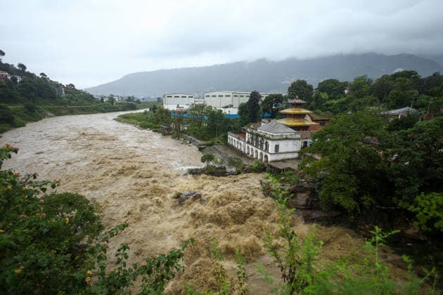 Red Alert Issued In Parts Of Nepal As Landslide Blocks Highways, Water Level Surge High Following Incessant Rainfall Flood water along the Bagmati River is seen from the Chobhar Gorge following heavy rain over two days on September 25, 2026. The Weather Forecasting Division under the Department of Hydrology and Meteorology (DHM) has issued a five-day special weather warning bulletin, urging the public and concerned agencies to remain alert Friday and Saturday as rainfall and weather-related hazards are expected to increase across various parts of the country. In capital Kathmandu, the Bagmati River has swollen and breached its embankments following rainfall of over 36 hours. The DHM has further warned of light to heavy rainfall and weather-  Copyright: xSubaasxShresthax originalFilename: shrestha-redalert260925_npGY5.jpg