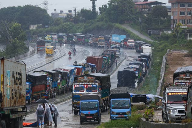 Red Alert Issued In Parts Of Nepal As Landslide Blocks Highways, Water Level Surge High Following Incessant Rainfall Heavy vehicles and trucks are parked along the Ring-road highway in Kathmandu, on September 25, 2026, after landslides blocked major highways and exit points from the capital following days of continuous rainfall. The Weather Forecasting Division under the Department of Hydrology and Meteorology (DHM) issued a five-day special weather warning bulletin, advising the public and agencies to remain alert on Friday and Saturday as rainfall and weather-related hazards are expected to increase across the country. In Kathmandu, the Bagmati River has swollen and breached its embankments following more than 36 hours of continuous rainf  Copyright: xSubaasxShresthax originalFilename: shrestha-redalert260925_npiWa.jpg