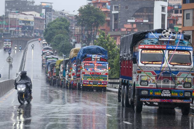 Red Alert Issued In Parts Of Nepal As Landslide Blocks Highways, Water Level Surge High Following Incessant Rainfall Heavy vehicles and trucks are parked along the Ring-road highway in Kathmandu, on September 25, 2026, after landslides blocked major highways and exit points from the capital following days of continuous rainfall. The Weather Forecasting Division under the Department of Hydrology and Meteorology (DHM) issued a five-day special weather warning bulletin, advising the public and agencies to remain alert on Friday and Saturday as rainfall and weather-related hazards are expected to increase across the country. In Kathmandu, the Bagmati River has swollen and breached its embankments following more than 36 hours of continuous rainf  Copyright: xSubaasxShresthax originalFilename: shrestha-redalert260925_npkU8.jpg