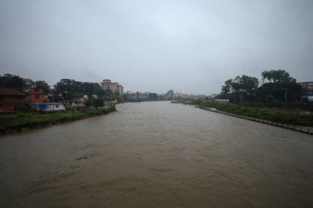 Red Alert Issued In Parts Of Nepal As Landslide Blocks Highways, Water Level Surge High Following Incessant Rainfall The swollen Bagmati River flows through Kathmandu, Nepal, on August 25, 2026, as rain continues to fall across the country. The Weather Forecasting Division under the Department of Hydrology and Meteorology (DHM) has issued a five-day special weather warning bulletin, urging the public and concerned agencies to remain alert Friday and Saturday as rainfall and weather-related hazards are expected to increase across various parts of the country. In Kathmandu, the Bagmati River has breached its embankments following more than 36 hours of rainfall. The DHM has warned of light to heavy rainfall and potential weather-related disast  Copyright: xSubaasxShresthax originalFilename: shrestha-redalert260925_npOTR.jpg