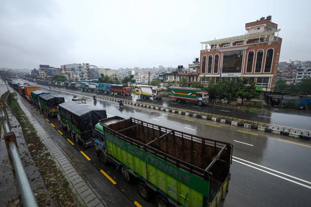 Red Alert Issued In Parts Of Nepal As Landslide Blocks Highways, Water Level Surge High Following Incessant Rainfall Heavy vehicles and trucks are parked along the Ring-road highway in Kathmandu, on September 25, 2026, after landslides blocked major highways and exit points from the capital following days of continuous rainfall. The Weather Forecasting Division under the Department of Hydrology and Meteorology (DHM) issued a five-day special weather warning bulletin, advising the public and agencies to remain alert on Friday and Saturday as rainfall and weather-related hazards are expected to increase across the country. In Kathmandu, the Bagmati River has swollen and breached its embankments following more than 36 hours of continuous rainf  Copyright: xSubaasxShresthax originalFilename: shrestha-redalert260925_npv9a.jpg